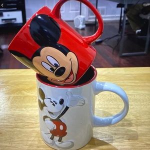 (2) Mickey Mouse Mugs -.(2) Red 12 oz. (1) White 16 ounce